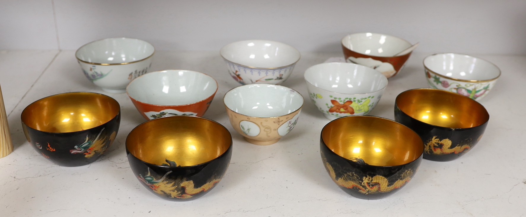 Seven Chinese enamelled porcelain bowls, Republic Period, largest 12.3 cm and four Fuzhou lacquer bowls